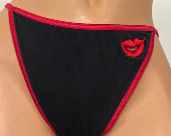 Braguita tanga bikini vintage Joe Boxer negra con estampado de labios rojos y aberturas, 100 % algodón, talla L