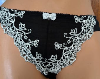 Braguitas de bikini tipo tanga de nailon transparente negro vintage Valisare Sissy L