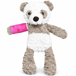 May include: A plush panda bear toy with soft, textured white and light brown fur. The panda has a dark brown nose and black eyes. A bright pink cast is wrapped around its right arm, covering the forearm area from the wrist to the elbow.