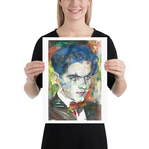 May include: Watercolour painting of a man with dark blue hair, wearing a white shirt with a red bow tie. The painting is done in a colourful style with shades of blue, green, yellow, red, and orange.