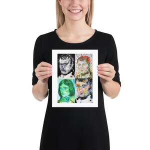 May include: A framed print of four portraits of men. The portraits are in different styles, including a black and white portrait, a colorful portrait, and a green portrait. The portraits are arranged in a grid pattern.