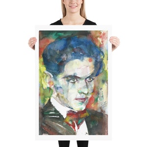 May include: Watercolour painting of a man with dark hair and a red bow tie. The painting is done in a colourful style with shades of blue, green, red, and yellow.