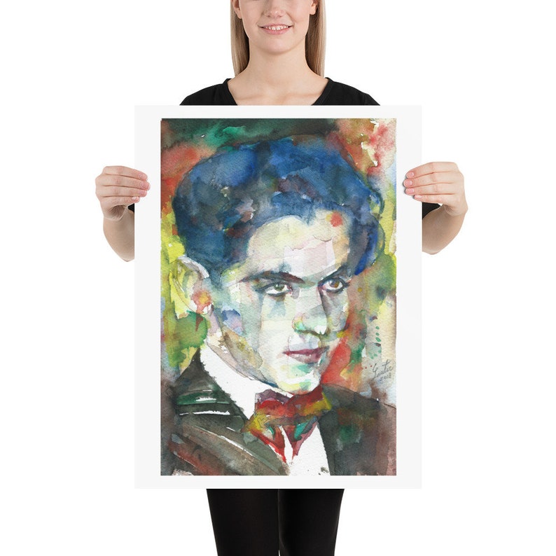 May include: Watercolour painting of a man with dark hair and a red bow tie. The painting is done in a colourful style with splashes of blue, green, yellow, and red.