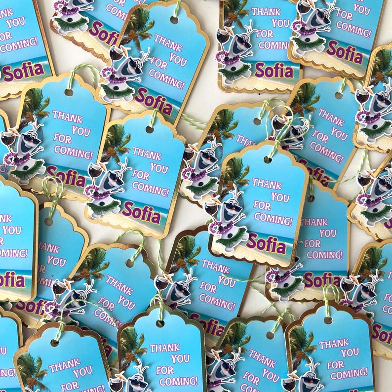 May include: A collection of blue gift tags with a tropical theme. Each tag features a cartoon character, the name "Sofia", and the text "Thank You For Coming!". The tags have a gold border and are strung with green twine.