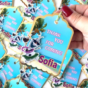 May include: Gift tags with a blue background and gold trim, featuring the text "THANK YOU FOR COMING!" and the name "Sofia". Each tag has a cartoon Olaf character with sunglasses and a lei.