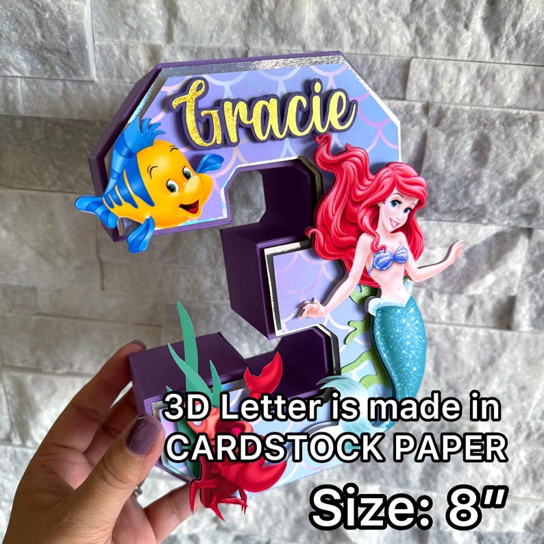 May include: A rustic wooden sign with the text "Welcome to our home" in white lettering. The sign features a distressed finish and a simple, inviting design, perfect for entryway decor.