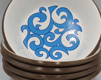 May include: Set of five brown and white ceramic bowls with a blue swirl design.