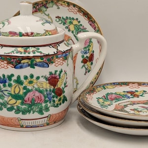 Vintage Asian Porcelain Tea Set: Teapot and 3 Plates with Floral Design