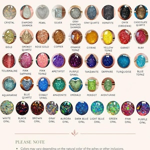May include: A color guide chart for jewelry keepsakes featuring rows of circular and shaped gemstone samples labeled with names like Crystal, Diamond Shimmer, Pearl, Silver, Gray, Hematite, Onyx, Quartz, Gold, Topaz, Garnet, Ruby, and various Opals.