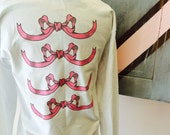 shirt with bow in back