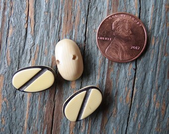 Set of 3 Small Plastic Black and Ivory Colored Buttons