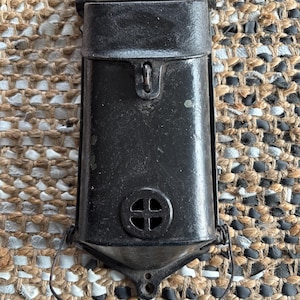Antique Griswold cast iron mailbox, likely dating back to the early 20th century
