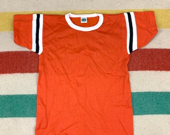 orange and red striped shirt