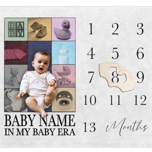 May include: A baby milestone chart with a colourful grid of images, including a baby, toys, and a baby bottle. The chart has numbers 1 through 13, with the text "BABY NAME IN MY BABY ERA" and "Months".