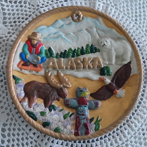 Kitchy tacky Alaska souvenir plate wall art