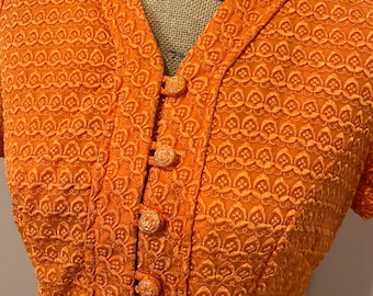 Mod and groovy Floring&#39;s dress in delicious shade of orange sherbet