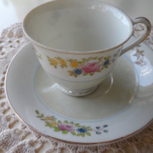 Marked LB Made In Occupied Japan tea cup and saucer floral design