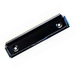 May include: Black metal binder clip with two holes. The clip is designed to hold papers together.