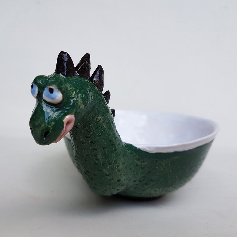 dinosaur with bowl head