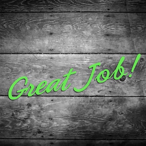 May include: A black and white wood background with the words "Great Job!" written in green cursive.