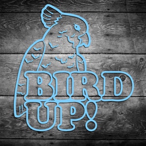 May include: A blue outline of a bird with the text "BIRD UP!" on a woodgrain background.