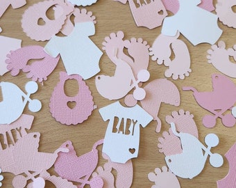 Roze babyshowerconfetti: tafeldecoraties voor meisjesfeesten
