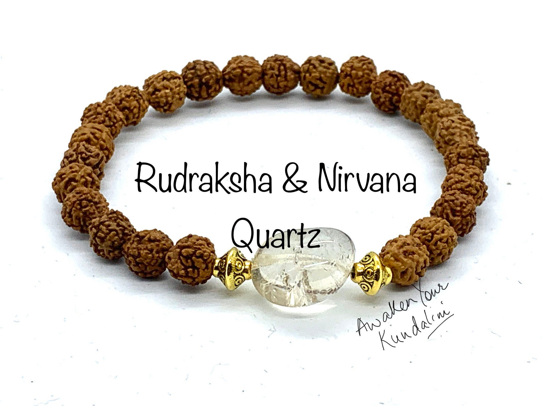 Rudraksha beads bracelet on Caucasian woman's hand, close up shot Stock  Photo | Adobe Stock