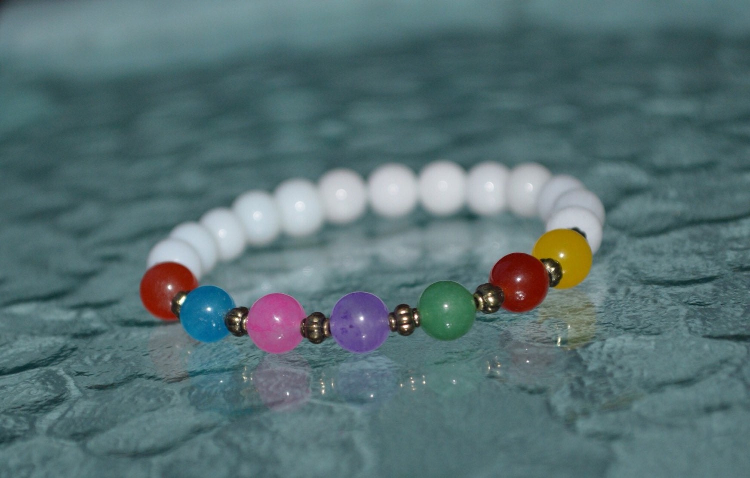 7 Chakras Meditation Hand Charm Beads Stretch Gemstone Bracelet – You Are  The Guru Gift Shop | Crystals, Gemstones, and Minerals