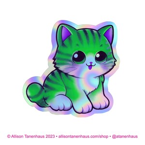 ホログラムのおとぎ話の緑の猫のステッカー。ビニール製の子猫のステッカー。魔法の猫のラップトップ ステッカー。猫の車のステッカー。ビニール製のラップトップの猫。ウォーターボトルのステッカー。