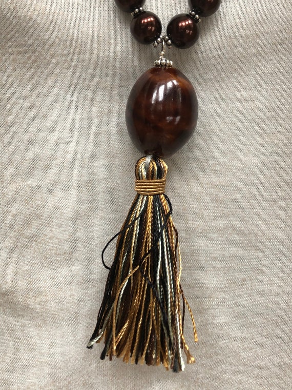 Long tassel necklace, lariat style tassel necklace, multi-colored tassel necklace, long tassel necklace, brown long tassel necklace.