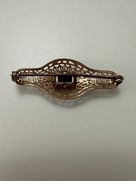 Rhinestone vintage brooch with filigree setting - image 4
