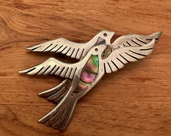 Sterling swallow brooch, southwestern/Mexico. Mother of pearl