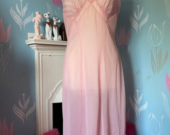 Vintage 1960s, 1970s pale pink with silver lurex nylon full slip, petticoat. Lingerie, lounge wear, underwear.