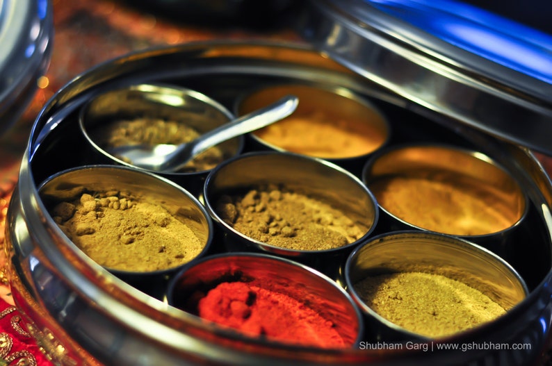 Masala Dabba or Indian Spice Tin with ground spices image 1