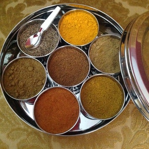 Masala Dabba or Indian Spice Tin with ground spices image 6