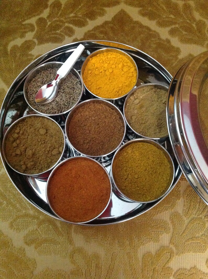 Masala Dabba or Indian Spice Tin with ground spices image 6