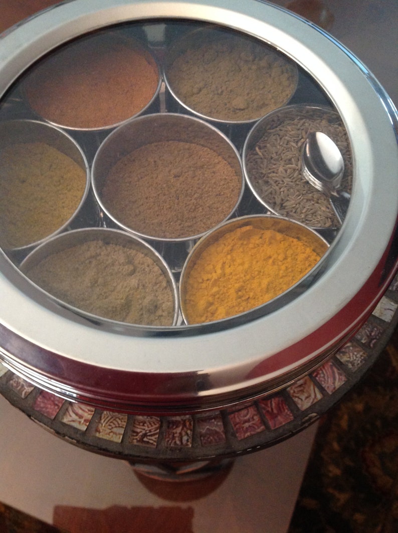 Masala Dabba or Indian Spice Tin with ground spices image 4