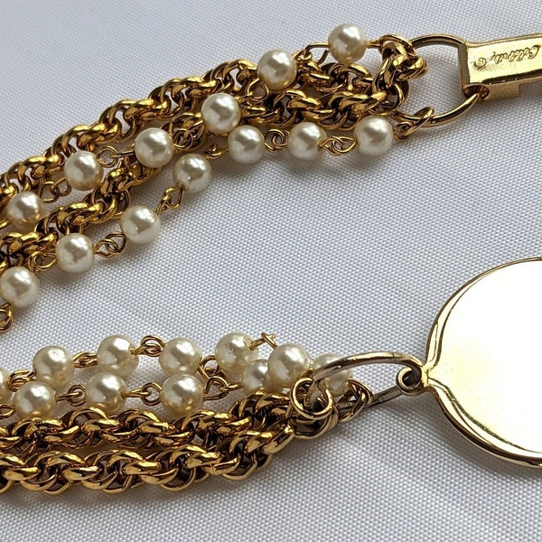 Vintage Signed Celebrity NY 4 Strand Bracelet Faux Pearl/Chains with Large Gold Tone Medallion