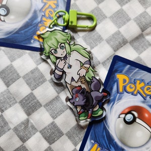 N Harmonia Acrylic Charm