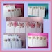 White Wedding place name cards. Packs of 10. ROSE flower decorations. 5 choices.