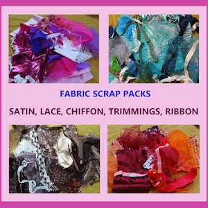 May include: A selection of fabric scrap packs containing satin, lace, chiffon, trimmings, and ribbon. The image shows four sections of fabric scraps in shades of pink, purple, blue, and brown. The text "FABRIC SCRAP PACKS" is displayed in the center.