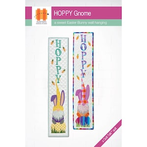May include: A digital pattern for a quilted wall hanging featuring a gnome with bunny ears and the word "HOPPY" in colorful letters. The pattern is titled "HOPPY Gnome" and is described as a "sweet Easter Bunny wall hanging".