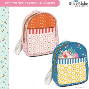 May include: Two quilted backpacks labeled Cotton Nook Panel Backpacks by Riley Blake Designs. One is pink with orange polka dots and cherry patterns, the other is blue with floral prints and yellow cherry patterns. Each measures 9 inches by 11 inches by 4 inches.