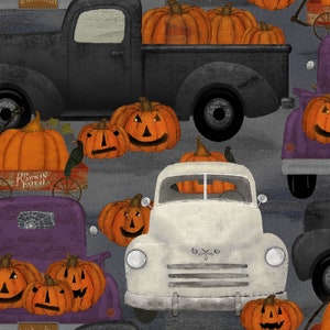 May include: A vintage white pickup truck with a pumpkin in the bed, surrounded by pumpkins and other vintage trucks. The truck has a black grill and headlights. The pumpkins are orange and have carved faces. The trucks are on a grey background.