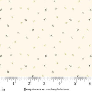 May include: Cream-colored fabric with a repeating pattern of small, stylized bird footprints in olive green and black. The fabric is measured in inches, with a ruler along the bottom edge.