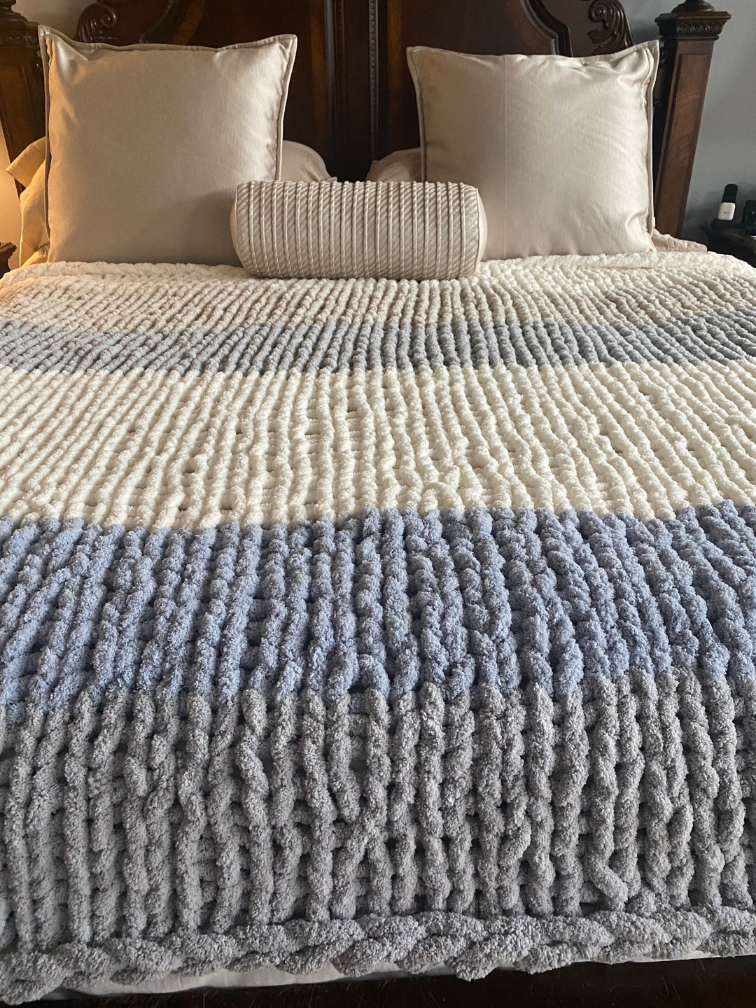 A chunky knit blanket in king size, perfect for cold winter nights