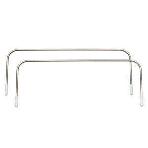 May include: Two silver metal garment hangers with white plastic tips. The hangers are designed to hang clothes on a rod.