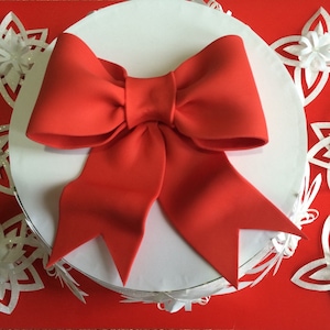 Red bow gum paste fondant for birthday cake