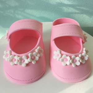 Baby shower cake toppper/ Pink baby girl shoes with small flowers gum paste fondant