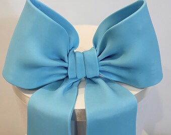 Big light blue fondant bow